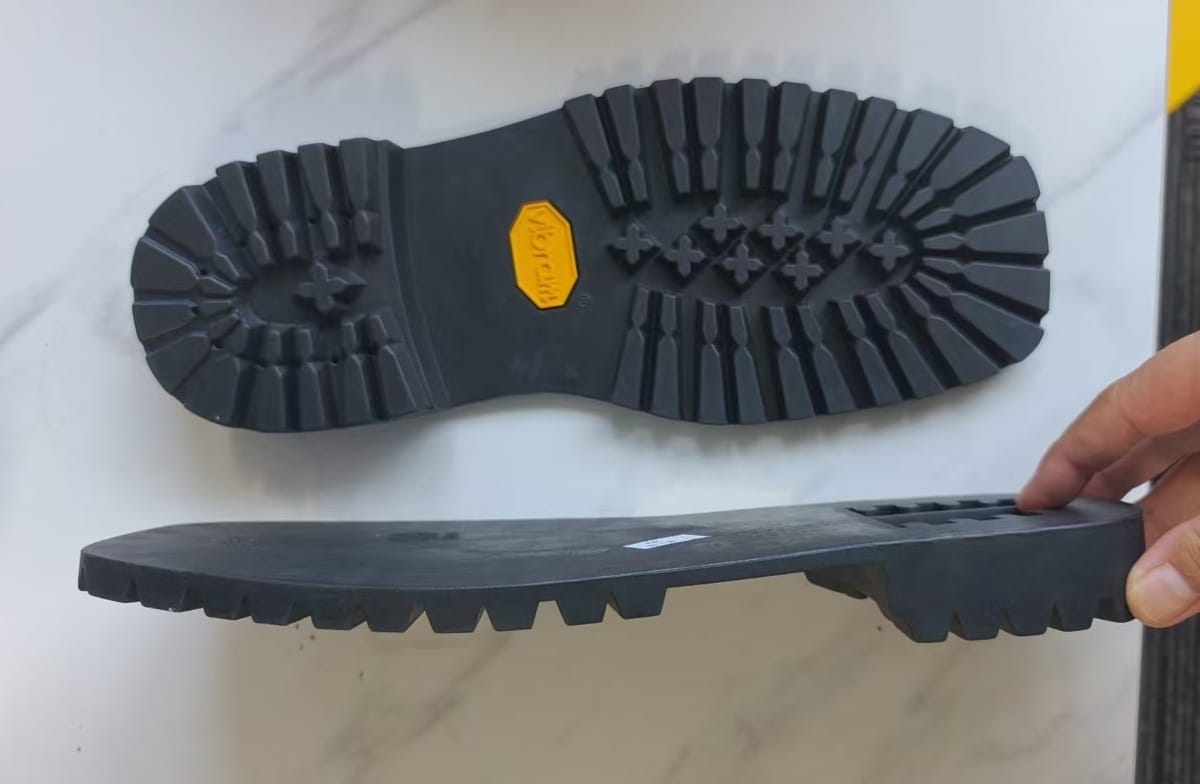 Rubber lug outsole unit shown from below and in profile